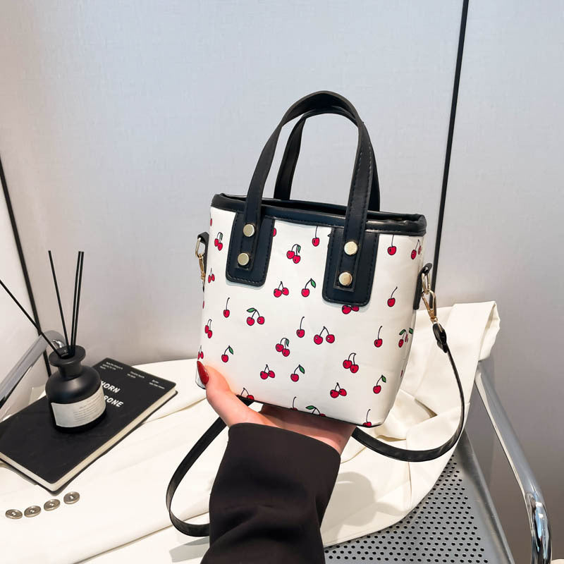 Women's mini handbag with fruity cherry design