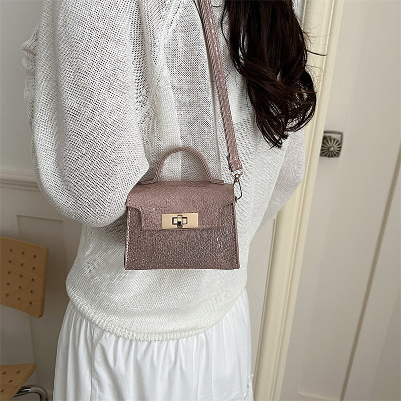 Women's mini handbag in stylish glamour style