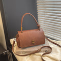 Women's elegant handbag with detachable shoulder strap