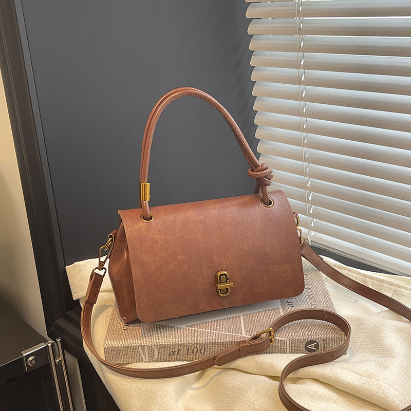 Women's elegant handbag with detachable shoulder strap