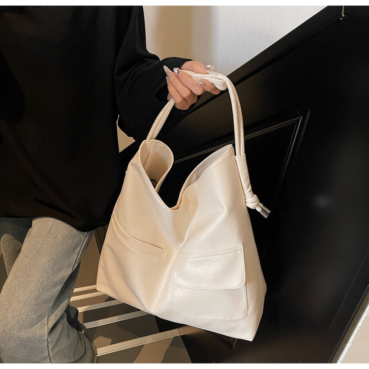 Casual tote bag with practical front pockets