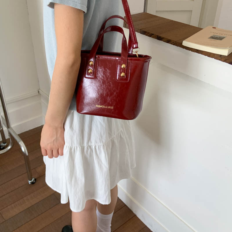 Women’s mini handbag with elegant chain closure