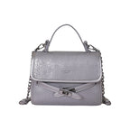 Ladies fashionable mini handbag with decorative magnetic closure