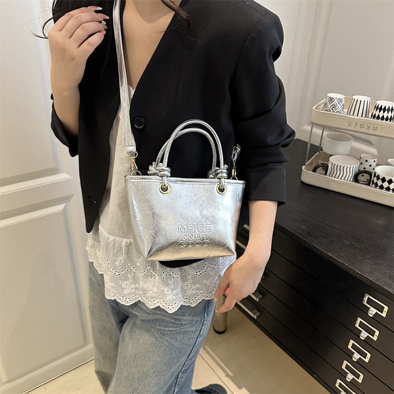 Women elegant mini handbag with structured design and removable shoulder strap