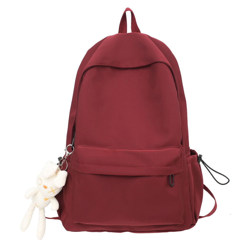 Multi-functional backpack with integrated keychain