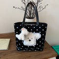 Plush shoulder bag with playful dog motif
