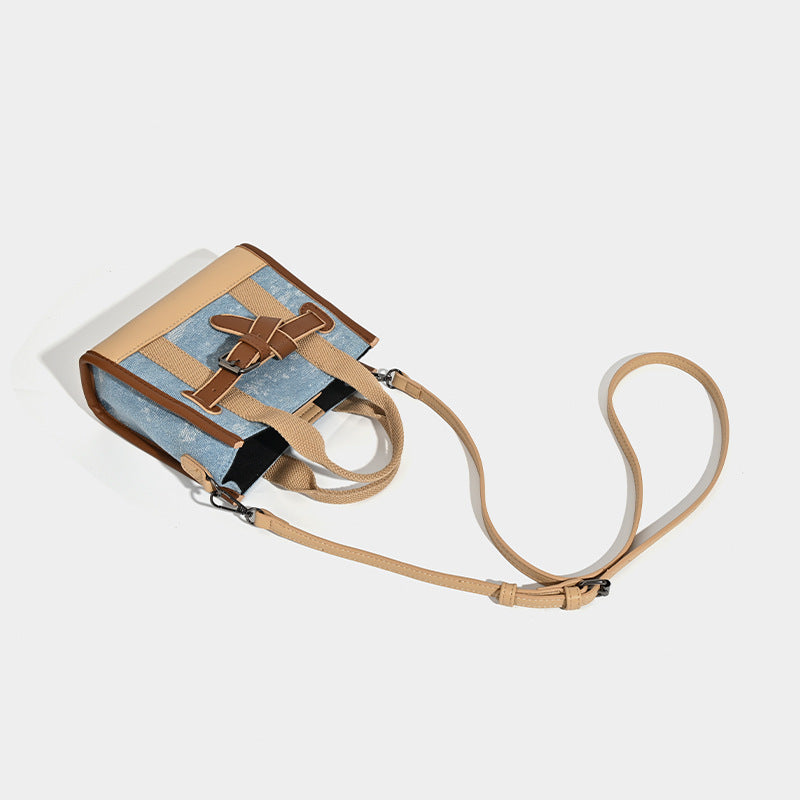 Women's mini handbag with trendy denim elements and practical drawstring