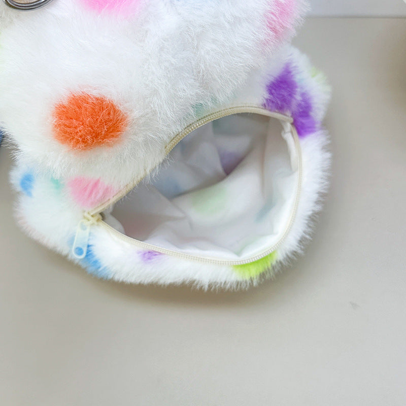 Plush bag with playful cat design