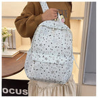 Backpack with Sparkling Star Motif and Charming Pendant