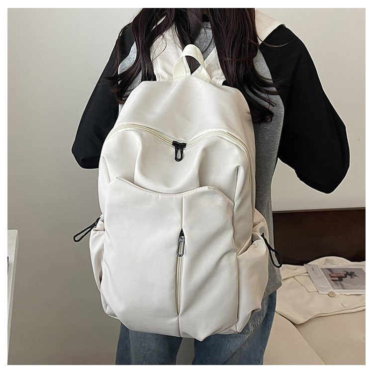 Backpack with ergonomic design and multifunctional compartments