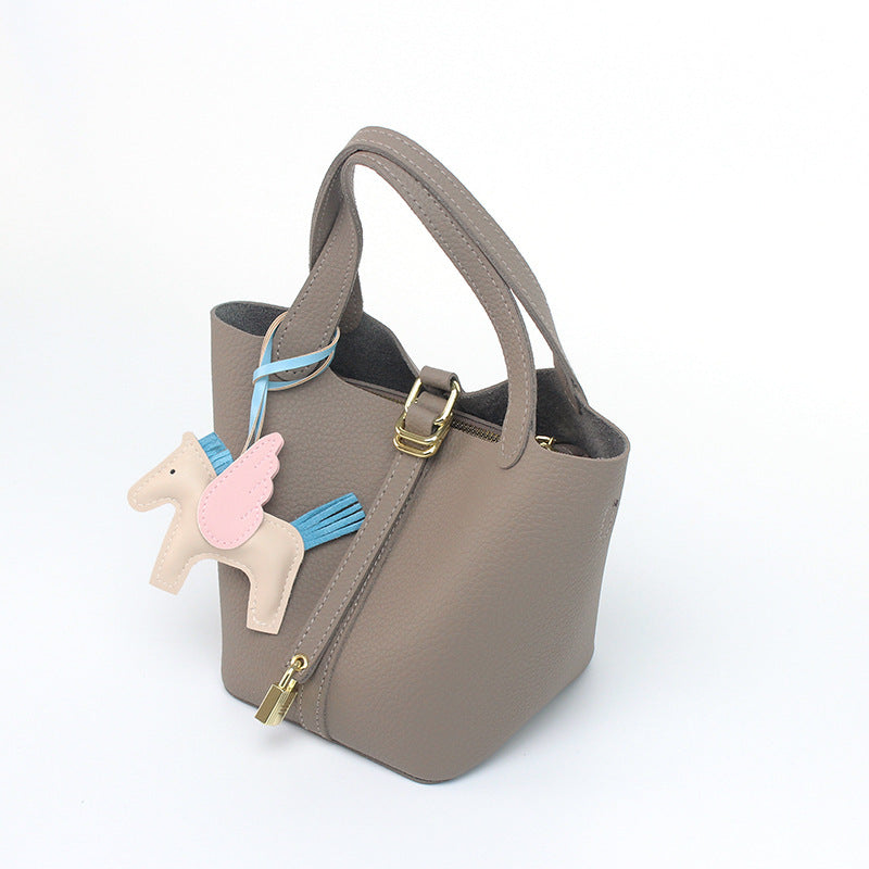 Women's hobo bag with removable mini organizer and charming animal pendant
