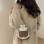 Ladies stylish mini handbag with drawstring and pearl accent