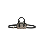 Ladies mini handbag with luxurious accents and adjustable shoulder strap