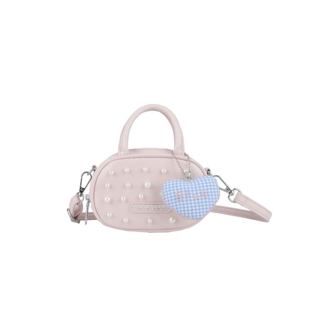Ladies trendy mini handbag with striking pearl applications
