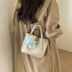 Ladies mini handbag with detachable cosmetic pouch