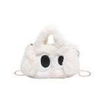 Cozy plush shoulder bag with ear application