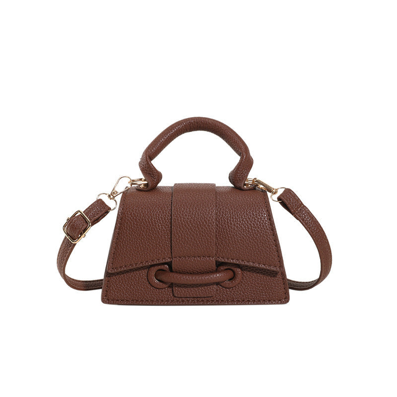 Women's mini handbag with textured leather and stylish closure