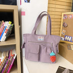 Tote bag with versatile compartments and ergonomic design
