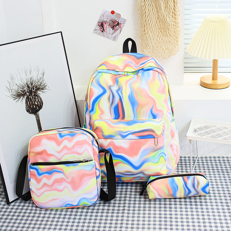 Stylish backpack with matching crossbody bag and pencil case