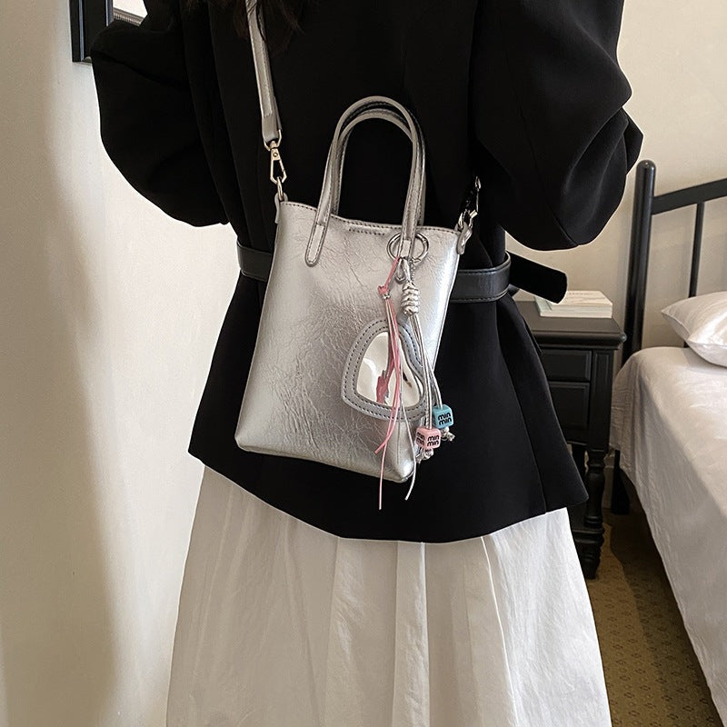 Ladies mini handbag with elegant pendant