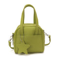 Ladies mini bag with decorative pendant