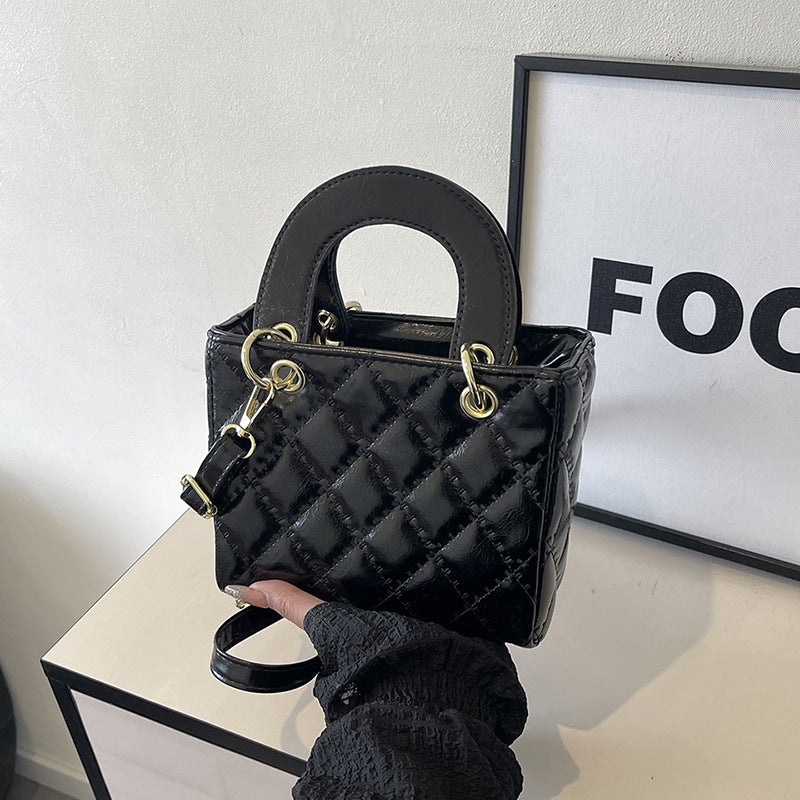 Ladies elegant mini handbag with quilted design