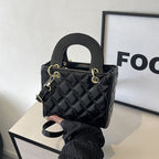 Ladies elegant mini handbag with quilted design