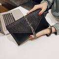 Women's clutch with stylish chain accent