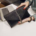 Women's clutch with stylish chain accent
