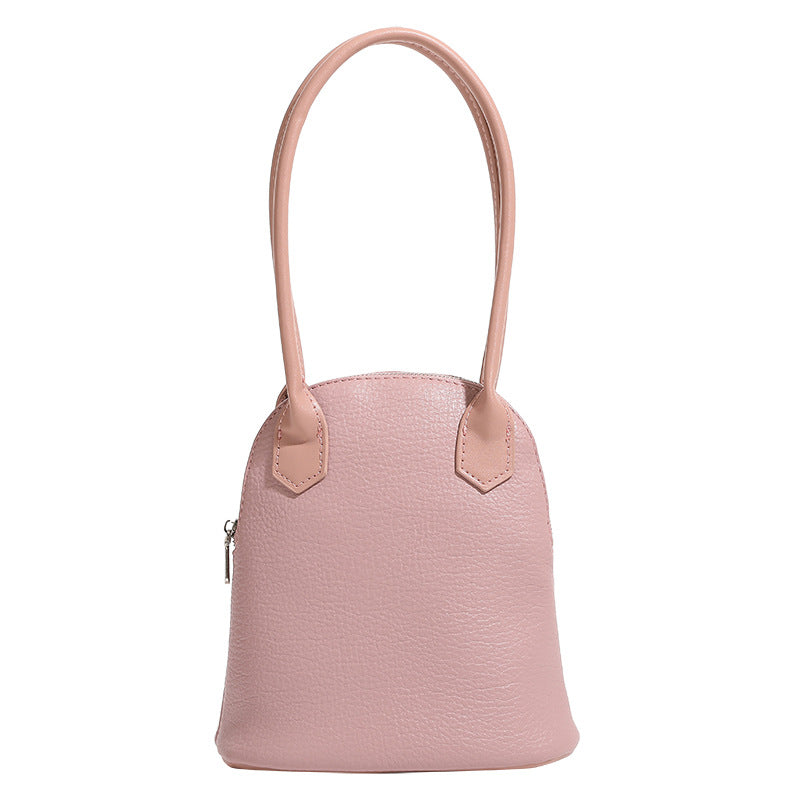 Women's mini handbag in modern design with practical zipper