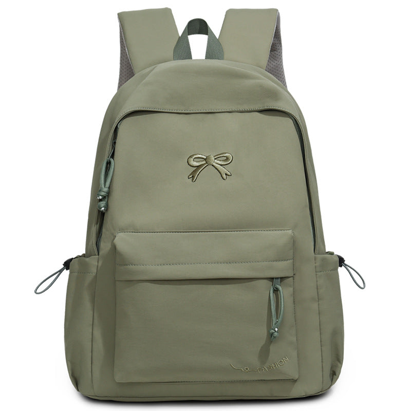 Fashionable backpack with practical outer pockets