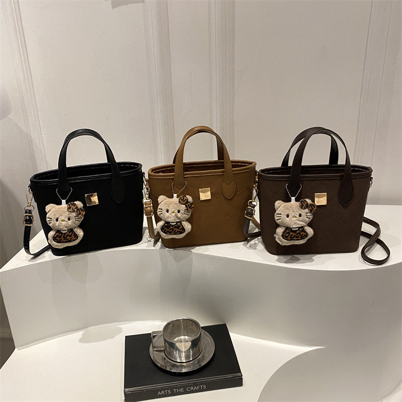 Ladies trendy mini bag with high-quality crocodile pattern and removable plush toy charm