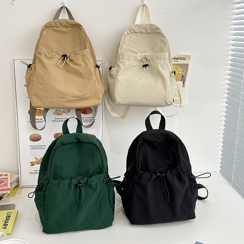 Leisure backpack with innovative drawstring and comfortable carrying system