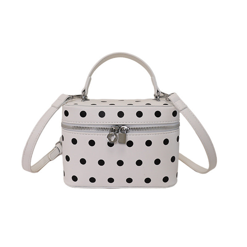 Women's mini handbag with playful design and elegant accents