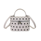 Women's mini handbag with playful design and elegant accents