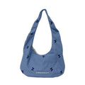 Comfortable shoulder bag with original embroidery motif