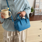 Women’s mini handbag with textured artificial leather and elegant design