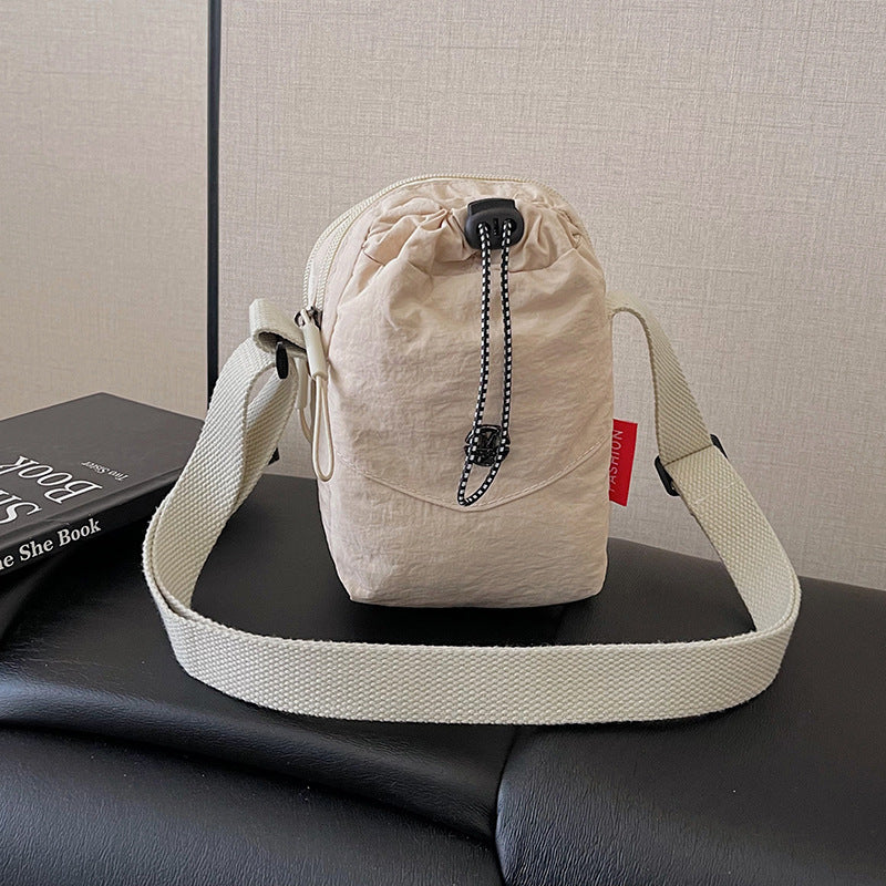 WoCompact Drawstring Crossbody Bag