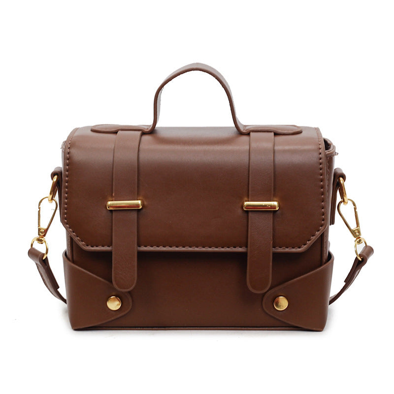 Women's mini handbag with textured design and detachable shoulder strap