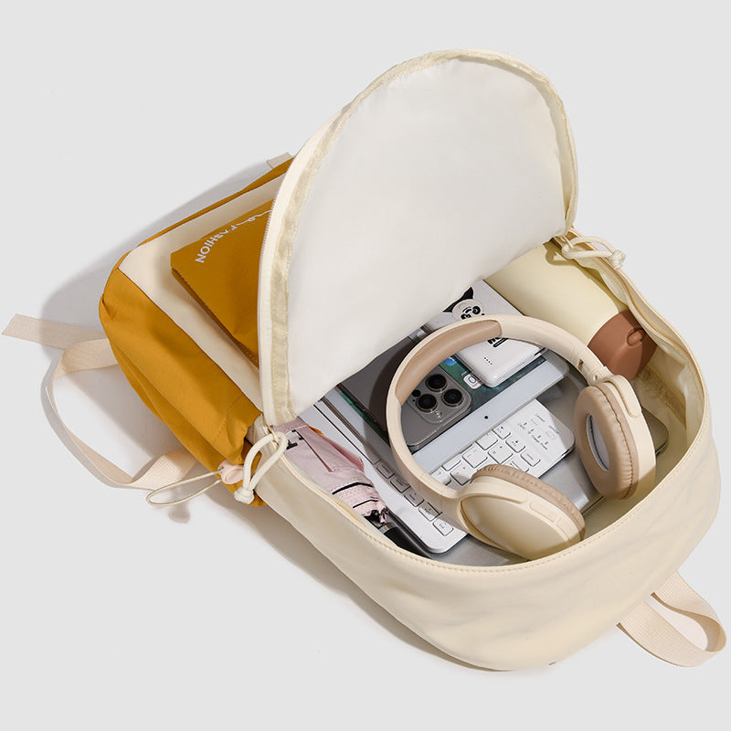 Fashionable backpack with practical outer pockets