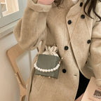 Ladies stylish mini handbag with drawstring and pearl accent
