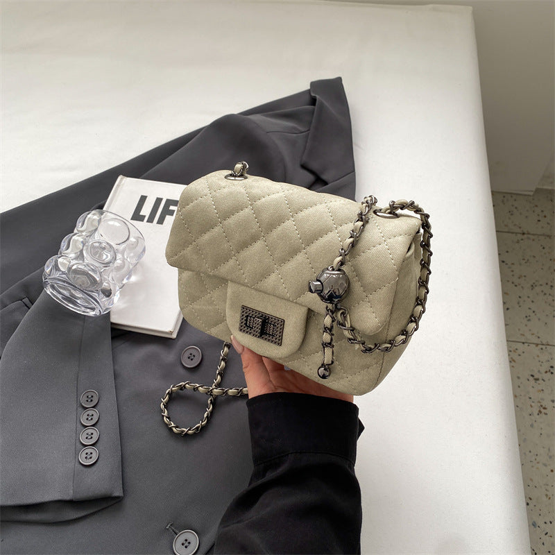 Women's mini handbag with padded design and elegant chain strap