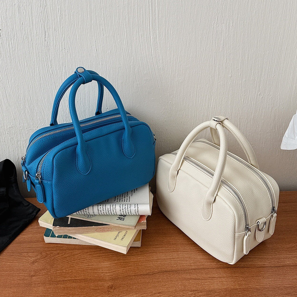 Women’s mini handbag with textured artificial leather and elegant design