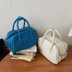 Women’s mini handbag with textured artificial leather and elegant design