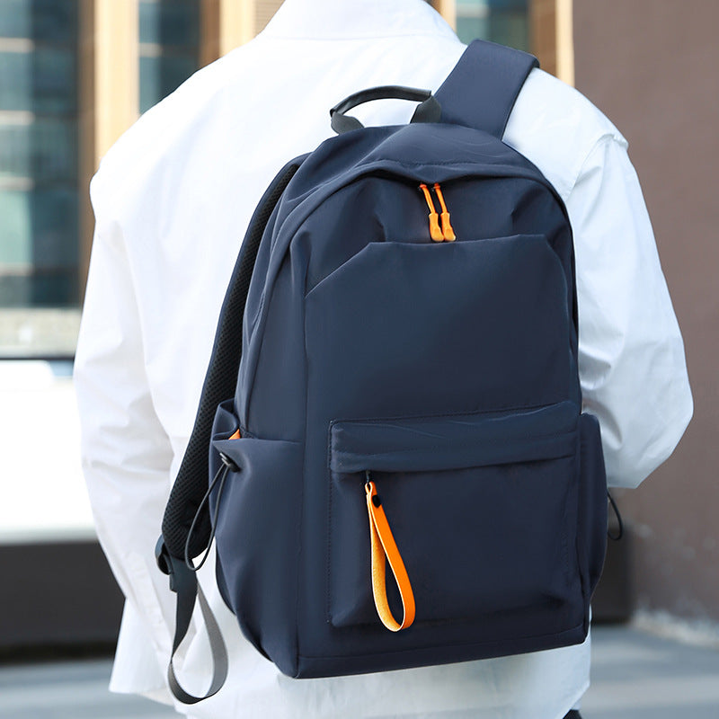 High-functional backpack with multiple compartments and ergonomic carrying elements