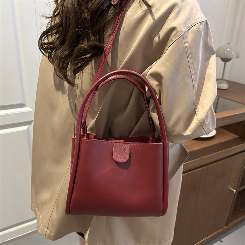 Ladies elegant mini handbag with practical flap closure