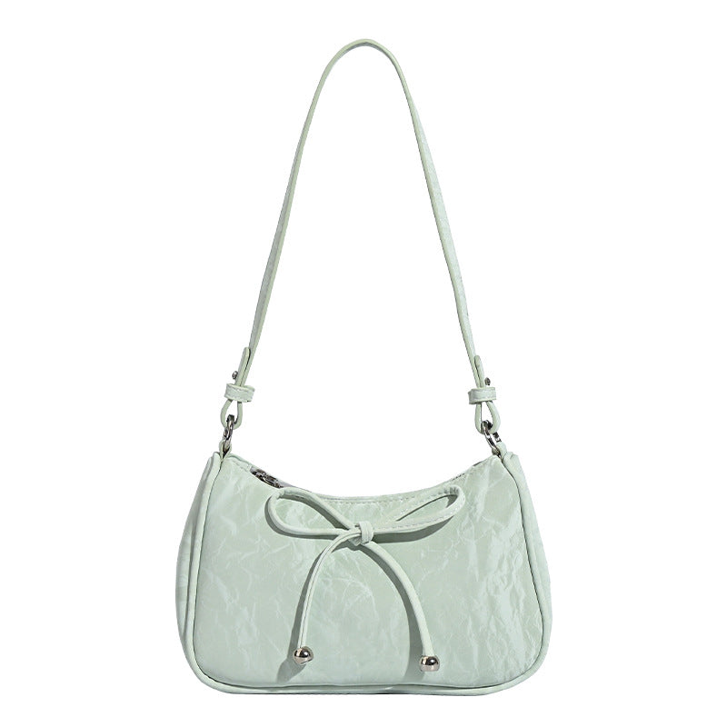 Ladies elegant mini handbag with playful drawstring