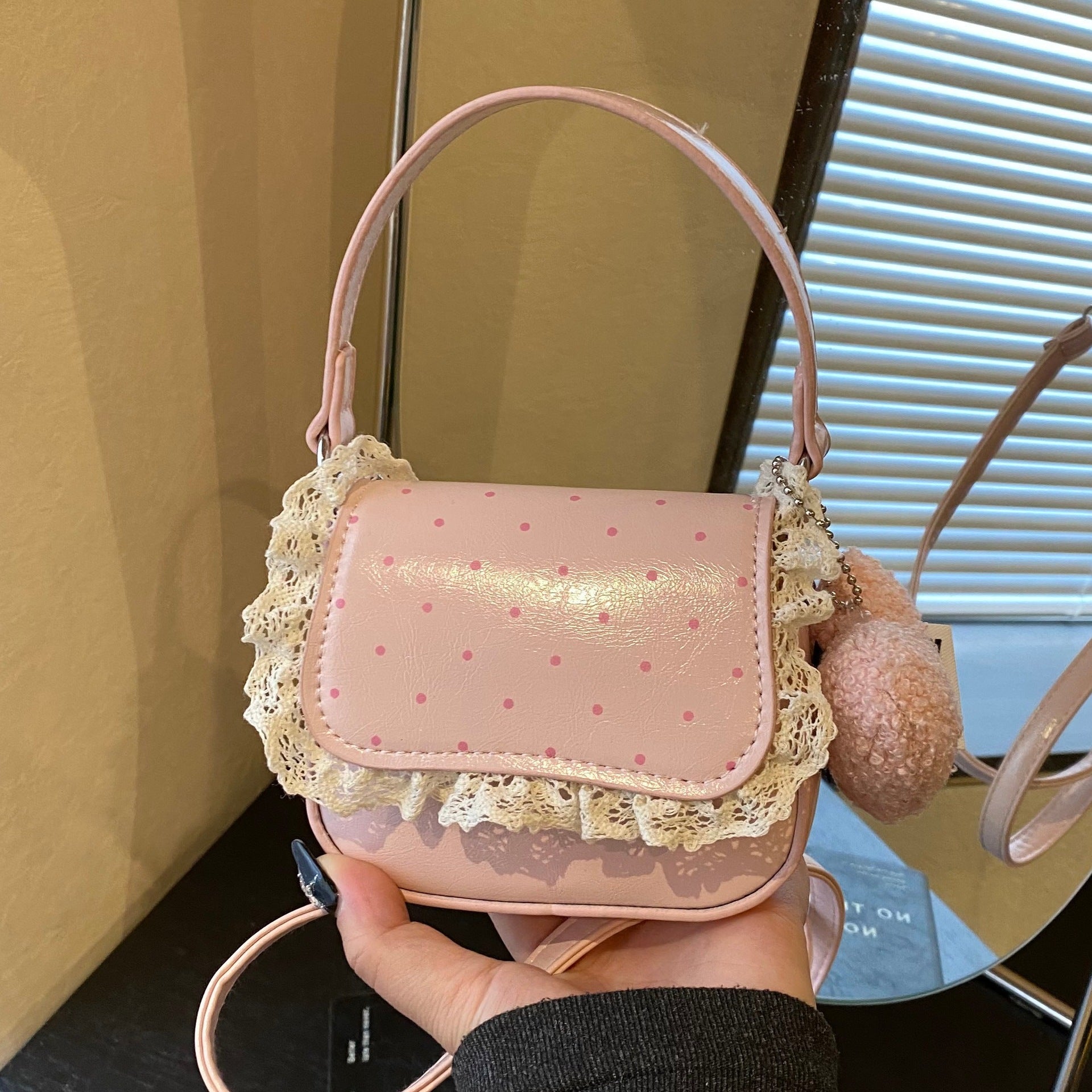 Women’s mini handbag with playful design and unique details