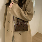 Women’s mini handbag made of high-quality material with a textured surface