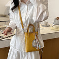 Ladies mini handbag with elegant pendant